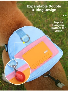 Dual D-ring detail on pet backpack harness showing attachment for lights and leash