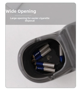 Close-up of the large top opening of a creative toilet-shaped ceramic ashtray