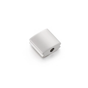 Detailed view of a polished silver square metal bead with central hole for DIY jewelry making
