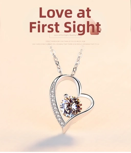 Macro shot of S925 silver heart necklace featuring a large sparkling zircon pendant