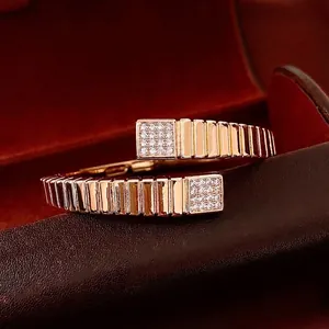Rose gold square bangle with vertical pleated texture and micro-pave crystals