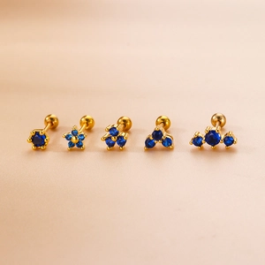 Five-piece set of gold stainless steel stud earrings with deep blue cubic zirconia stones