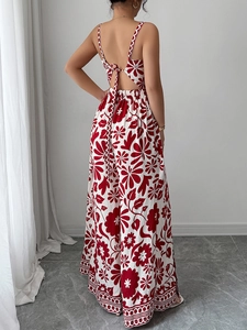 Back view of floral jumpsuit with red and white patterns and cross-tie straps