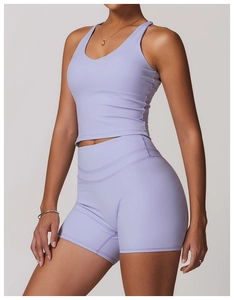 Detail of lavender v-neck yoga top and shorts set with matte high-elasticity fabric