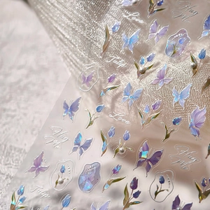 Iridescent butterfly and tulip nail art stickers with aurora finish for fairy aesthetics