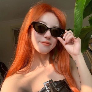 Classic black cat eye sunglasses for women with dark lenses and stylish resin frame