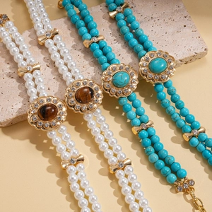 Double-layered beaded necklace with pearls, turquoise stones and vintage tiger eye pendants