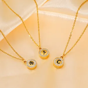 Minimalist 18K gold plated necklace with rhinestone pavé letter pendants on silk