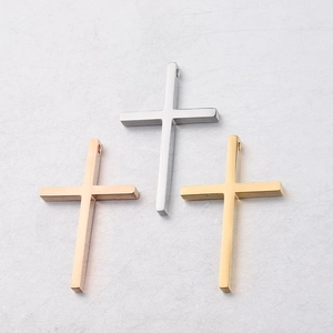 Mirror polished stainless steel cross pendants in rose gold, silver, and gold finishes