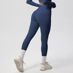 Detail view of high-waist yoga leggings showing matte texture and ergonomic butt-lifting seams