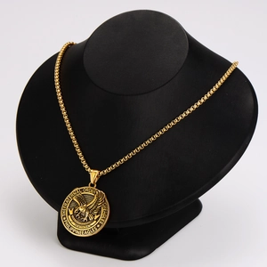 Vintage gold eagle medallion necklace featuring The Fraternal Order of Eagles crest
