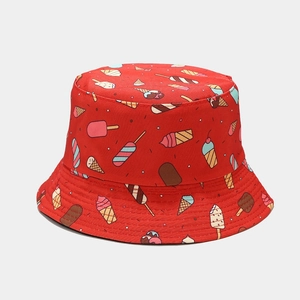 Detailed top view of red bucket hat with colorful cartoon ice cream and popsicle patterns