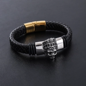 Punk braided leather bracelet for men with silver skull charm and golden magnetic clasp