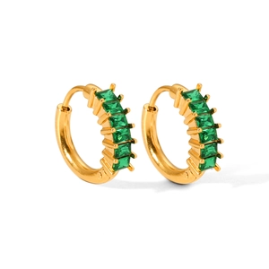 Detail view of gold-plated huggie hoops featuring five emerald-green rectangular zircons