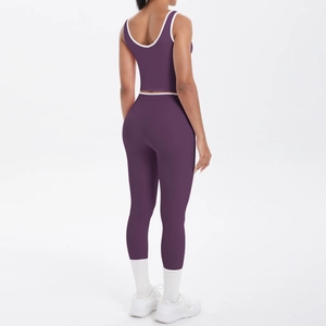 Rear view of purple yoga set featuring a racerback top and high waist leggings