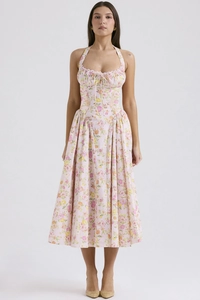 Detail of floral print summer maxi dress featuring a neck-tie and slim fit design