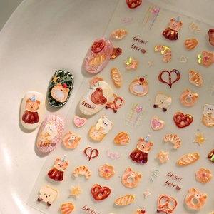 Cute bear and bakery cartoon nail stickers with warm caramel tones and glitter finish