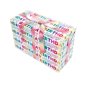 Rainbow Happy Birthday gift box featuring a colorful leopard print ribbon on white background