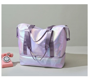 Detail of laser iridescent travel bag in pearly purple with dry wet separation compartment