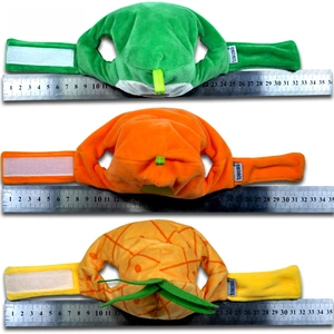 Detailed view of plush fruit pet hats with measuring ruler for size verification