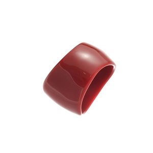Minimalist thick resin ring in bold red with high-gloss finish on a white background