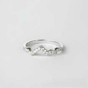 Macro view of S925 silver wave ring showing pave cubic zirconia and inner S925 engraving