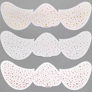 Three metallic butterfly freckle patches in gold silver and pink with star cutout designs