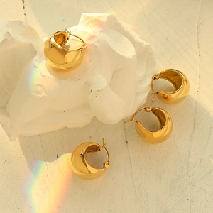 Chunky 18K gold plated stainless steel C-shaped hoop earrings on elegant white background