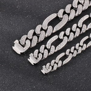 Macro shot of iced out silver hip-hop chain links with high quality zircon stones