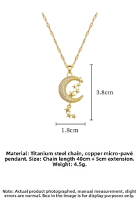 Detail view of gold-tone star and moon necklace with titanium steel chain and zircon