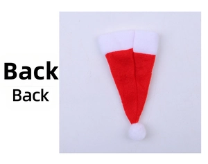Detailed back view of a red non-woven Christmas hat cutlery holder with white pompom