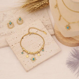 Bohemian gold stainless steel jewelry set with turquoise star and sun pendants