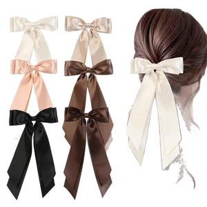 Large satin bow hair clip with elegant long ribbons available in six assorted colors