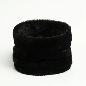 Close-up detail of soft black faux fur neck warmer with thick plush texture