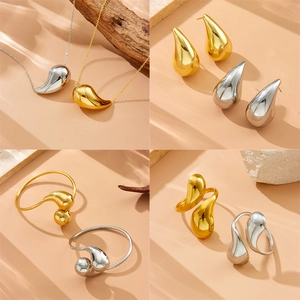 Minimalist gold and silver water drop jewelry set with necklace bracelet and earrings