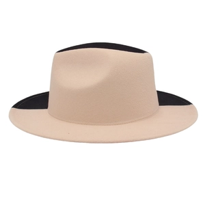 Detail of two-tone beige and black wide brim felt jazz hat with sharp color contrast