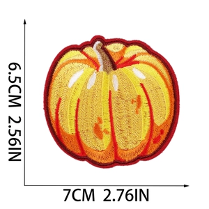 Detail of pumpkin embroidery patch in orange and red, size 7cm x 6.5cm on white background