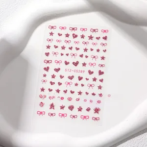 Close-up of pink glitter nail stickers featuring hearts and stars motifs STZ-CS289