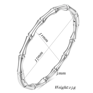 Detail view of silver bamboo pattern steel bracelet with 51x57mm dimensions and 5mm width