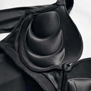 Close-up of black push up bra with palm-shaped padded cups for side breast support