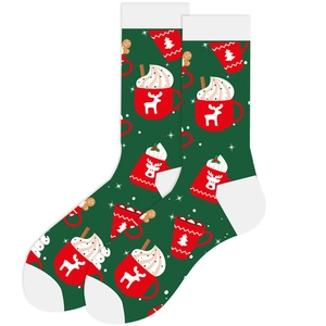 Detailed knit pattern of green Christmas socks with reindeer and tree holiday motifs
