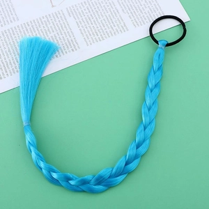 Detailed view of blue braided hair extension with black elastic band on soft background