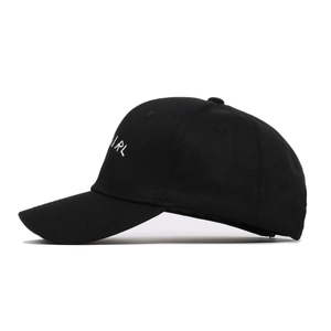Classic black cotton baseball cap with white IRL embroidery side view and curved brim