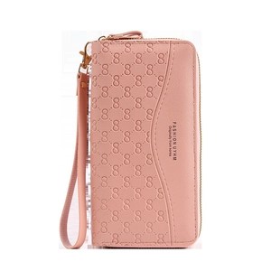 Long pink zip-around wallet with embossed pattern and detachable wrist strap for women