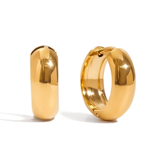 Detailed view of polished 18K gold-plated stainless steel huggie hoop earrings