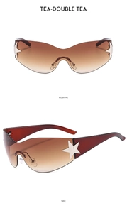 Detail of Y2K pilot sunglasses featuring tea gradient lenses and star side decorations