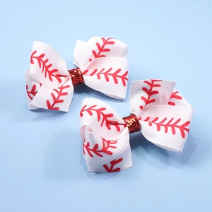 Detail of red glitter centers on baseball pattern ribbon bow hair clips for sports