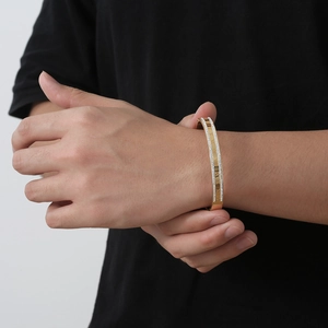 18K gold plated titanium steel bangle featuring Roman numerals and white zircon inlay