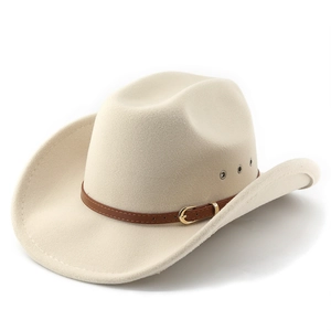 Detail of cream felt cowboy hat featuring brown leather band and metal buckle accent