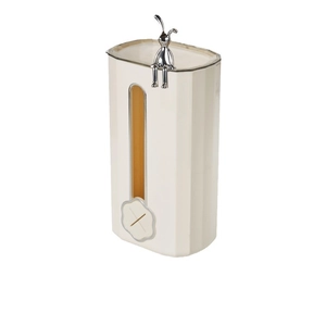 Cream-colored wall-mounted tissue box with decorative silver rabbit ornament on top